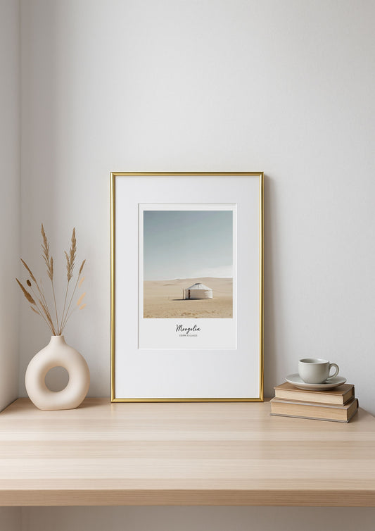 Framed artwork on a shelf with decor items